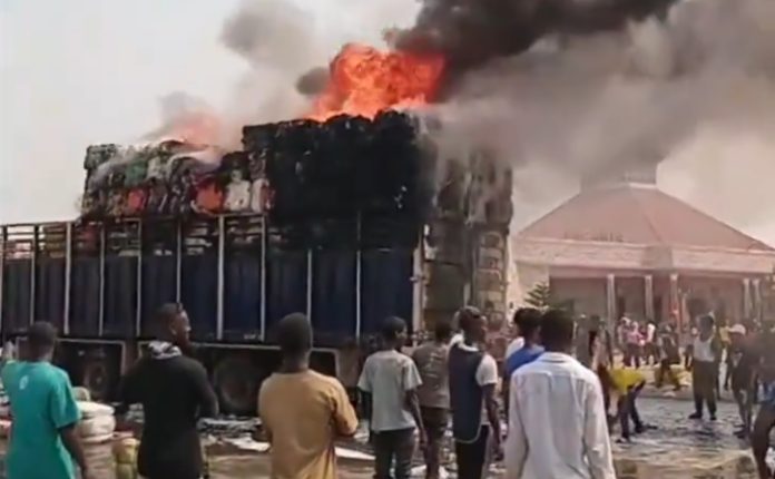 second-hand clothes in flames