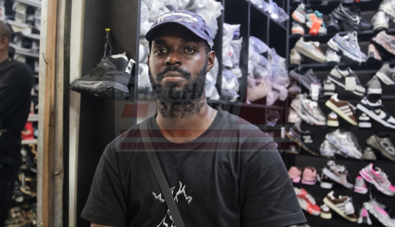 Koto Kofi Benjamin sells Timberland boots and sneakers at Kantamato